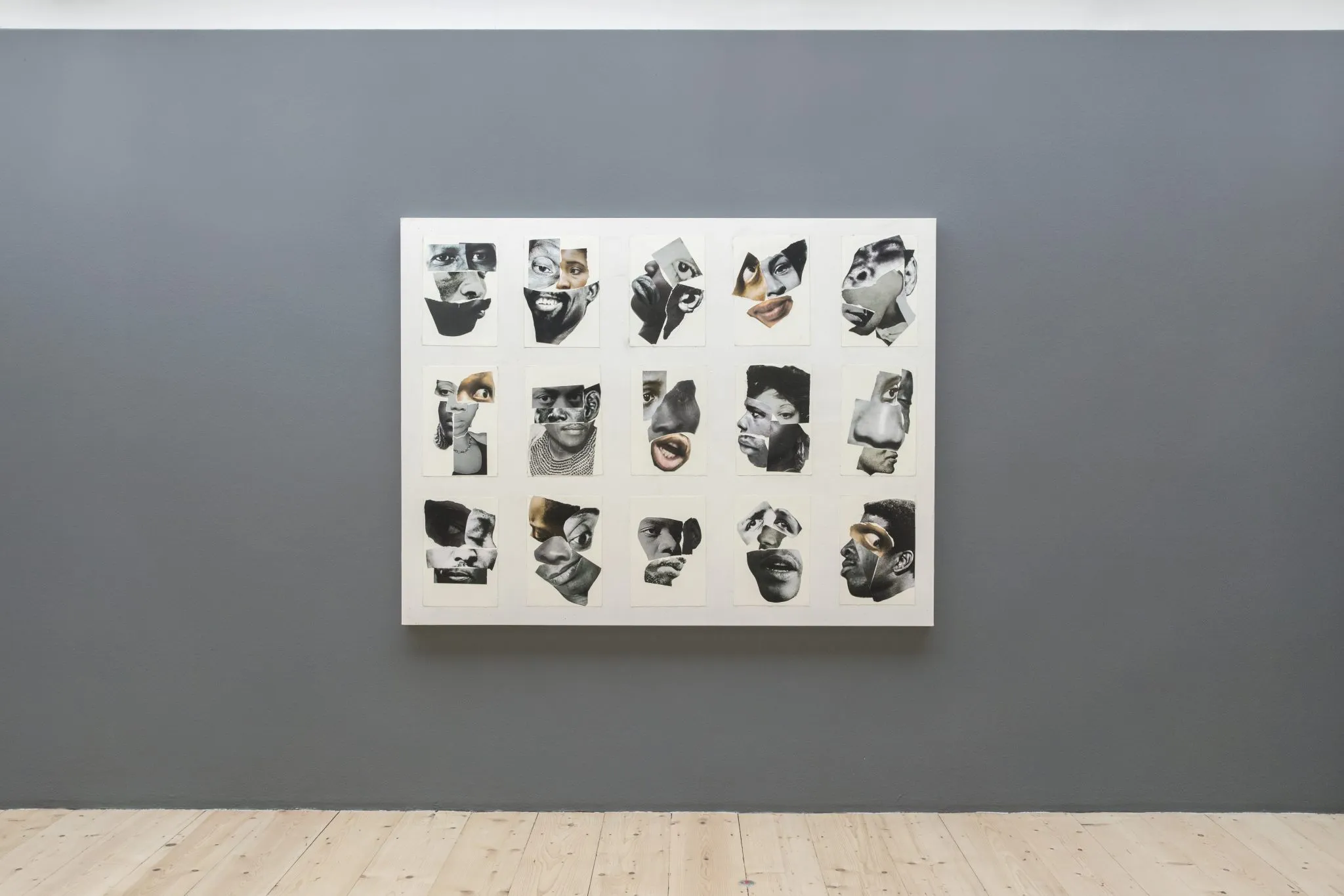 Collages of faces with different parts (eyes, ears, mouth etc), forming a total of 15 black and white portraits, applied on a canvas