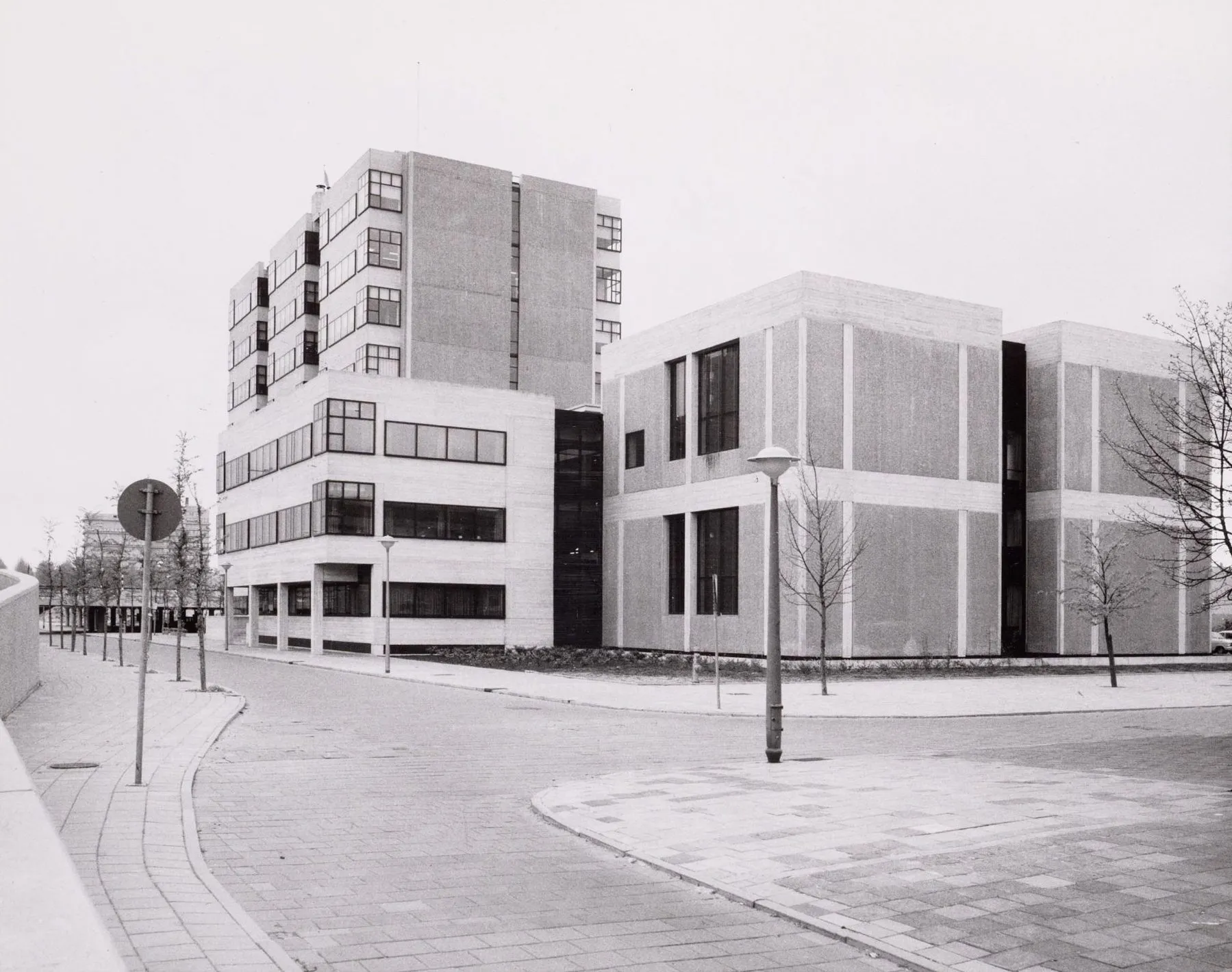 black & white photograph of the building Parnassuweg 220 with a few newly planted trees